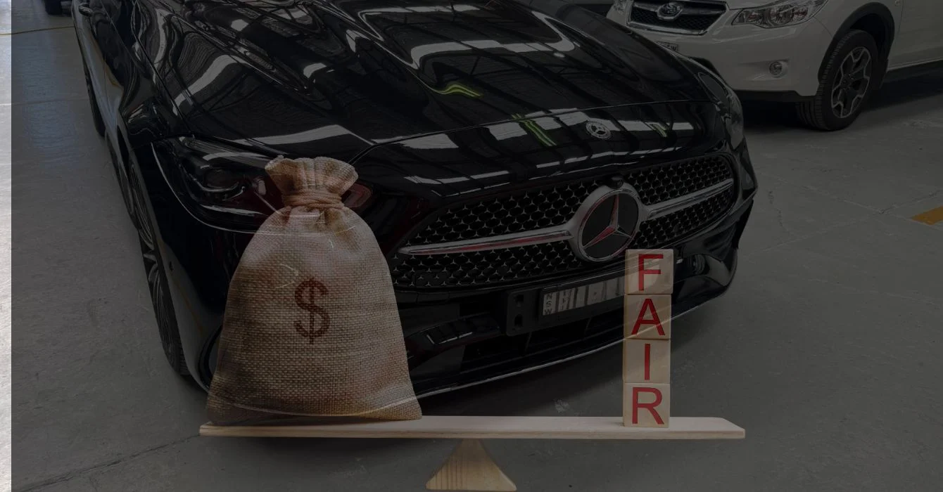 A fully repaired car with an overlay of a balanced scale—one side showing a money bag, the other labeled 'Fair'—symbolizing transparent and reasonable smash repair pricing.