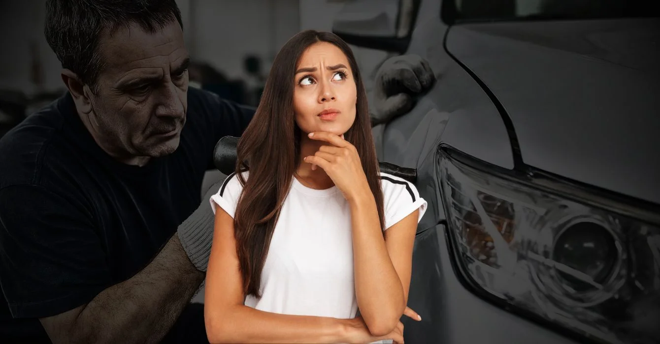 A photograph captures a male auto body repair technician using precision tools to restore a damaged car panel inside a well-lit smash repair workshop.